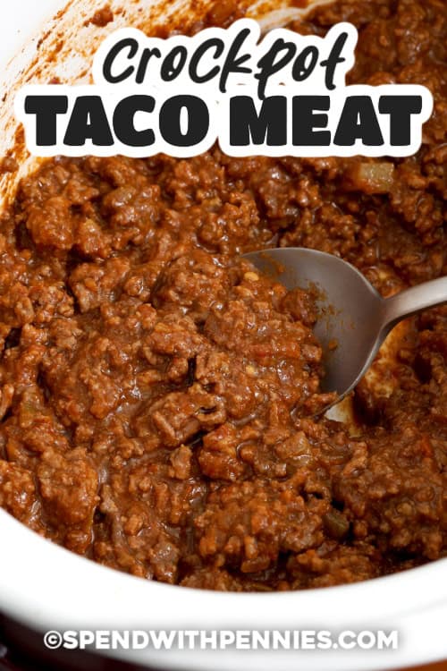 Close up of Taco meat in a crockpot with title