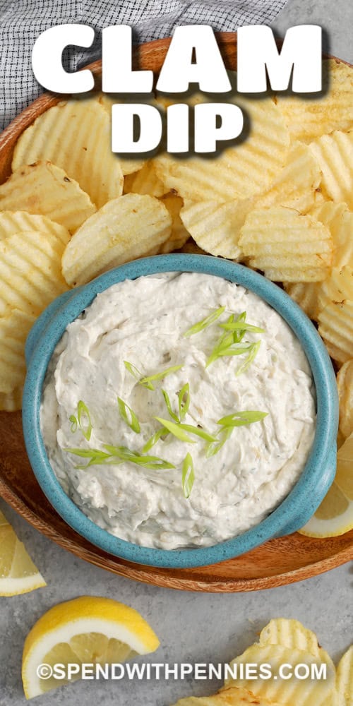 Overhead of Clam Dip and Chips garnished with green onion and a title