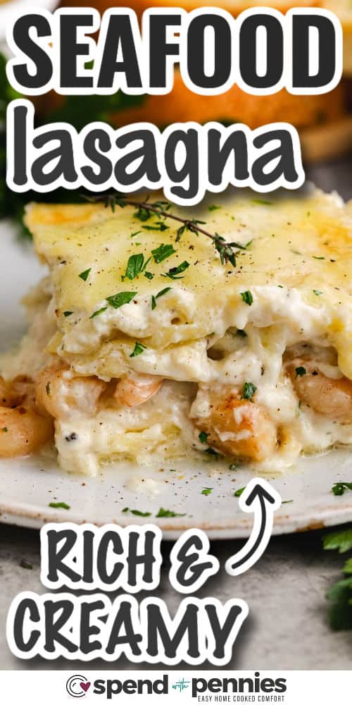 seafood lasagna on a plate with writing