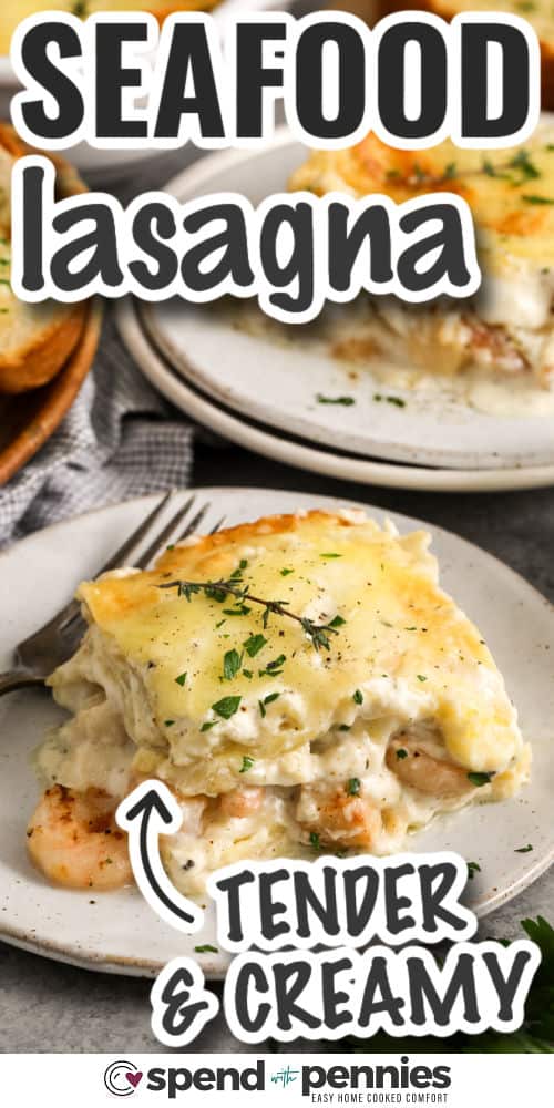 seafood lasagna piece on a white plate with writing