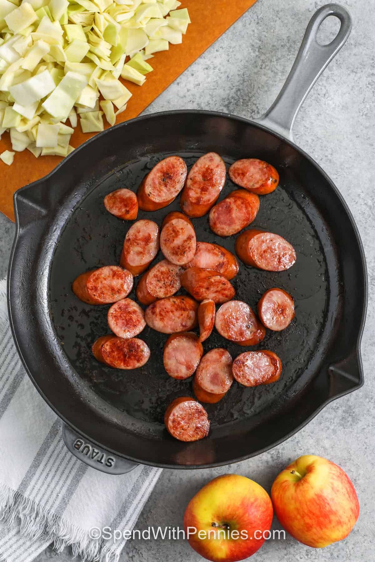 cooking kielbasa to make Sausage, Cabbage, and Apple Skillet