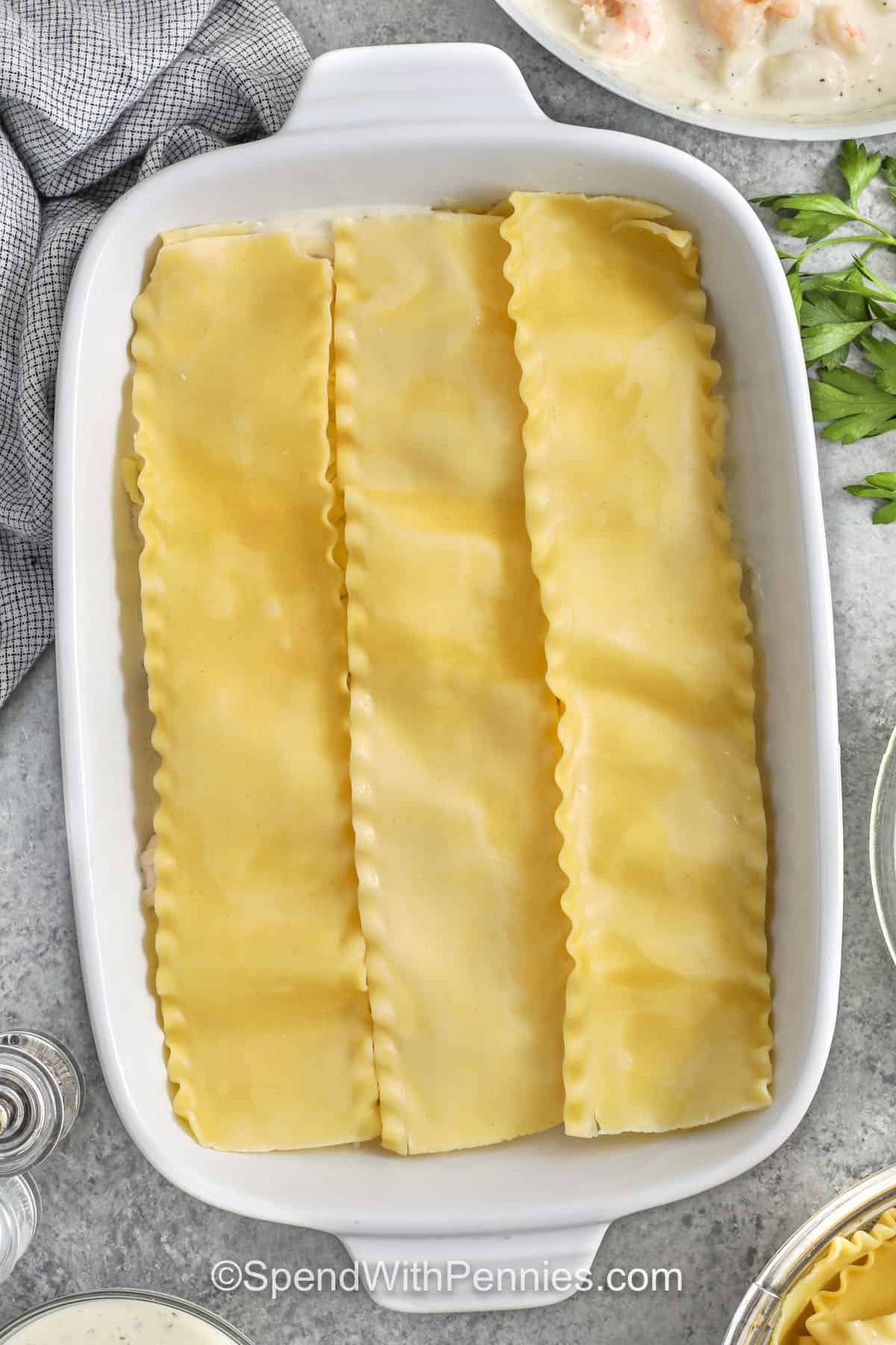 adding another layer of lasagna noodles to Seafood Lasagna