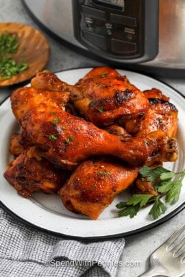 plate of juicy Slow Cooker Chicken Drumsticks