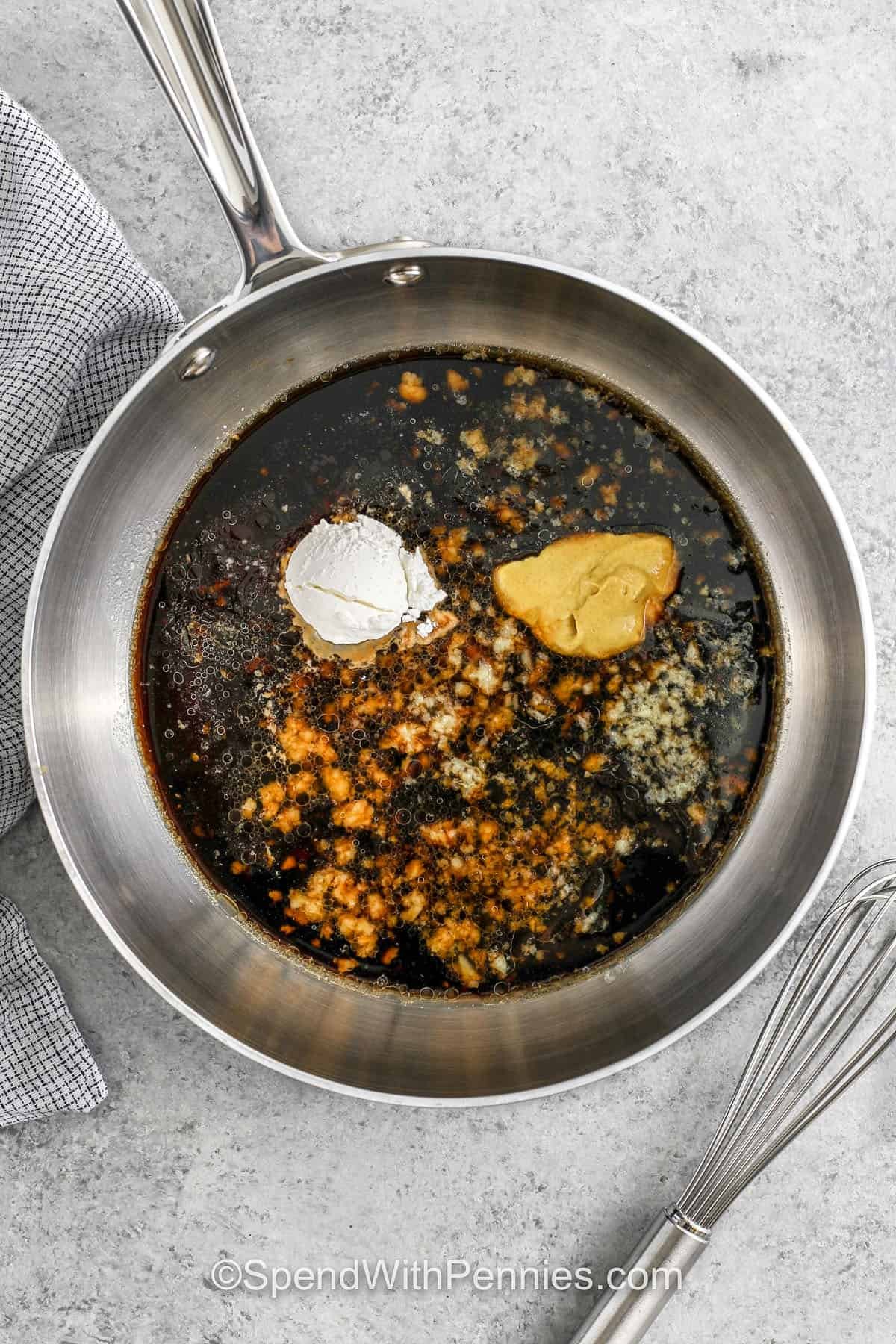 Make these sticky chicken thighs with a maple soy glaze. It’s quick to make, and coats each piece in a rich, savory sweetness you won’t want to miss. The oven does most of the work, crisping the skin while the glaze creates a golden brown color. With simple pantry staples and a quick stovetop sauce, this recipe is perfect for cooks who want bold flavor without any complicated steps. Serve over rice or veggies for a complete meal. #spendwithpennies making the sauce for sticky chicken thighs