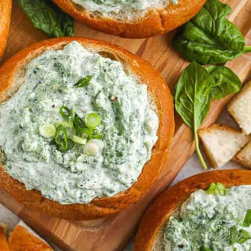 close up of Spinach Dip in a bread bowl