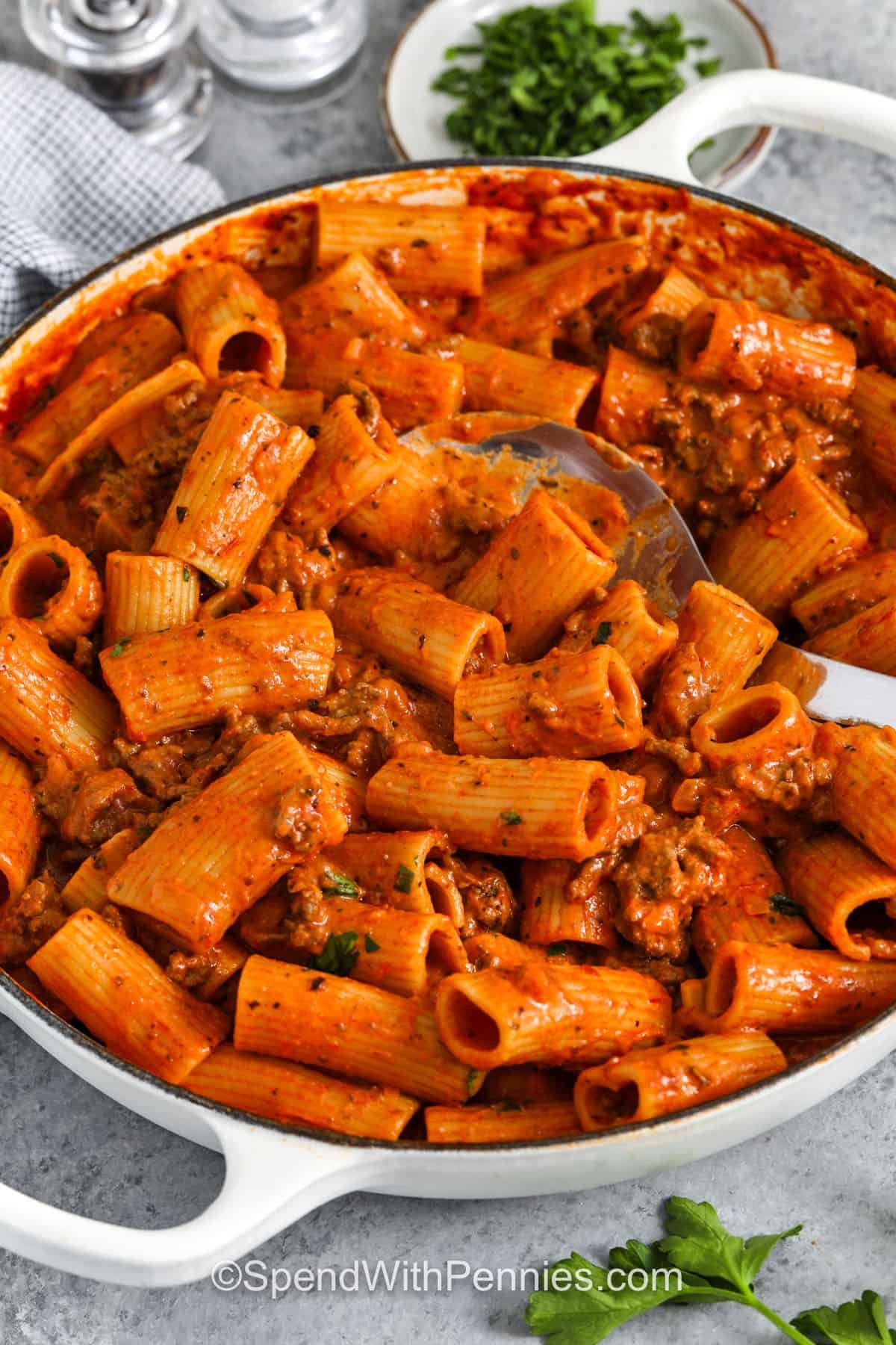 pot of Creamy Ground Beef Pasta with a spoon