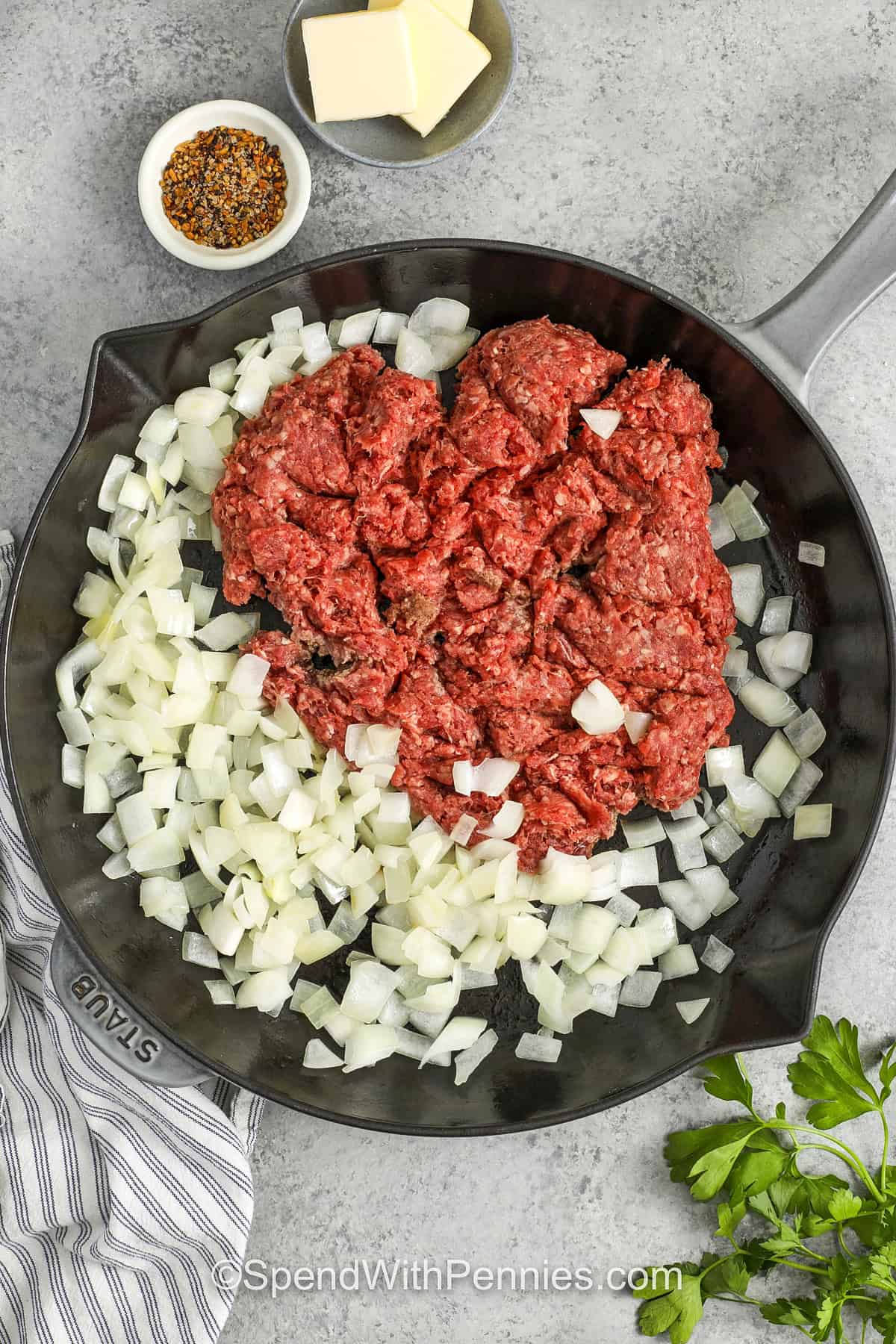 adding ground beef to onions to make Hamburger Hash