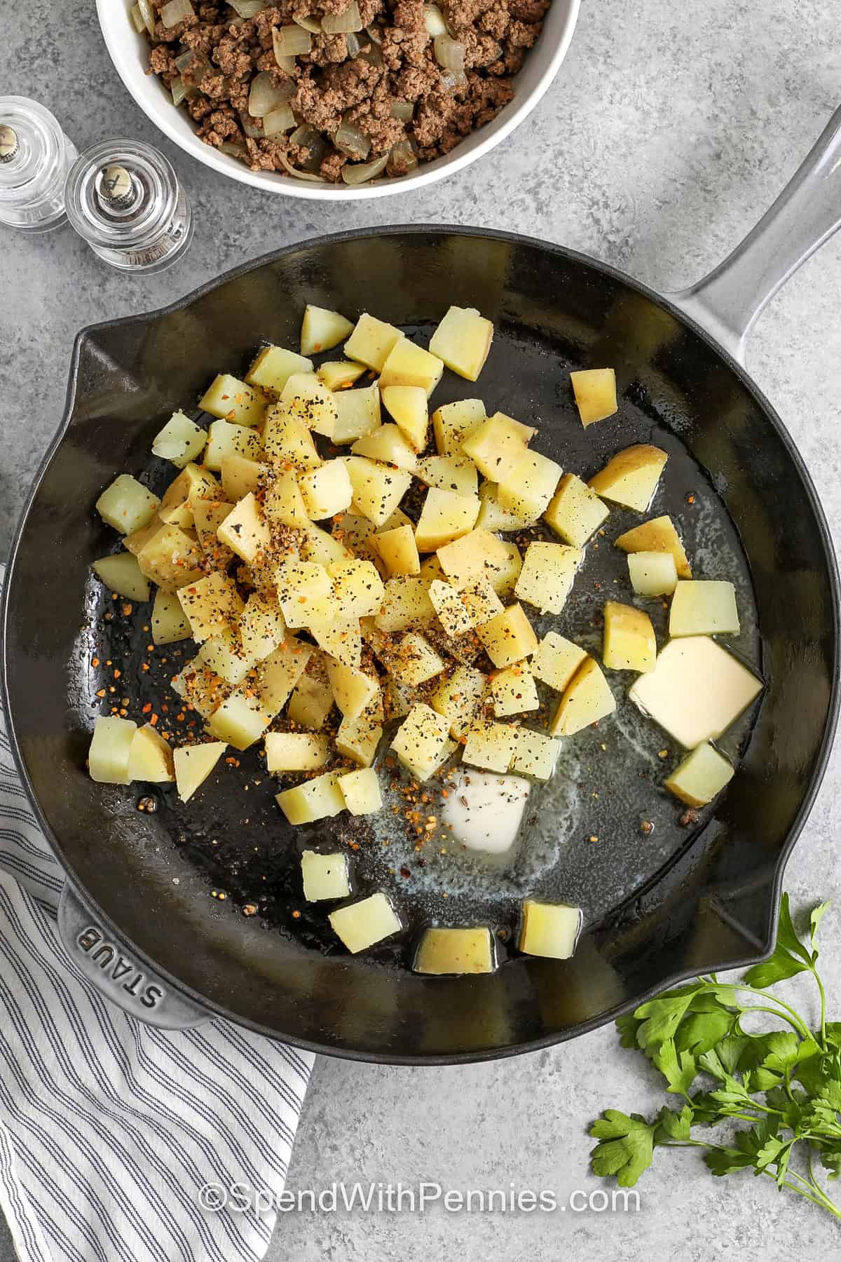 cooking potatoes to make Hamburger Hash