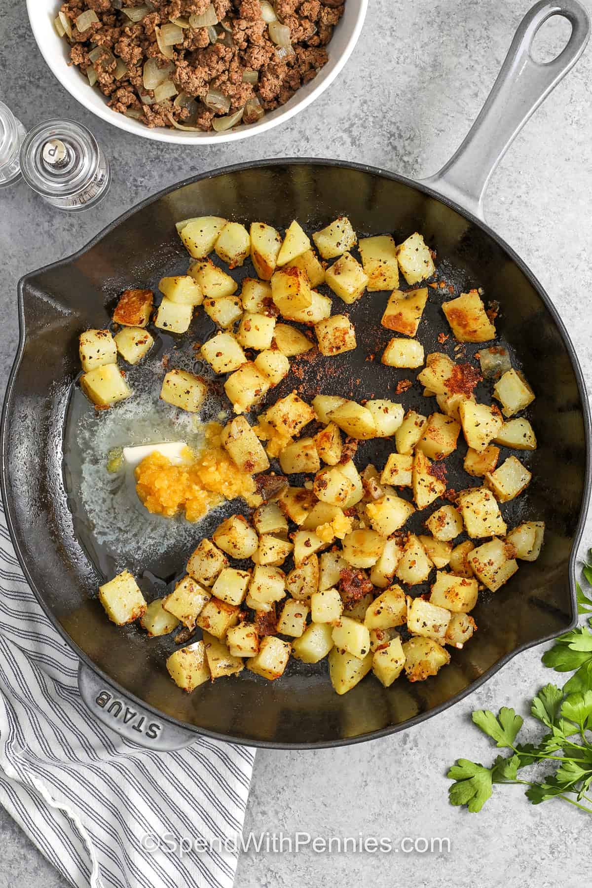 cooked potatoes with butter and garlic to make Hamburger Hash