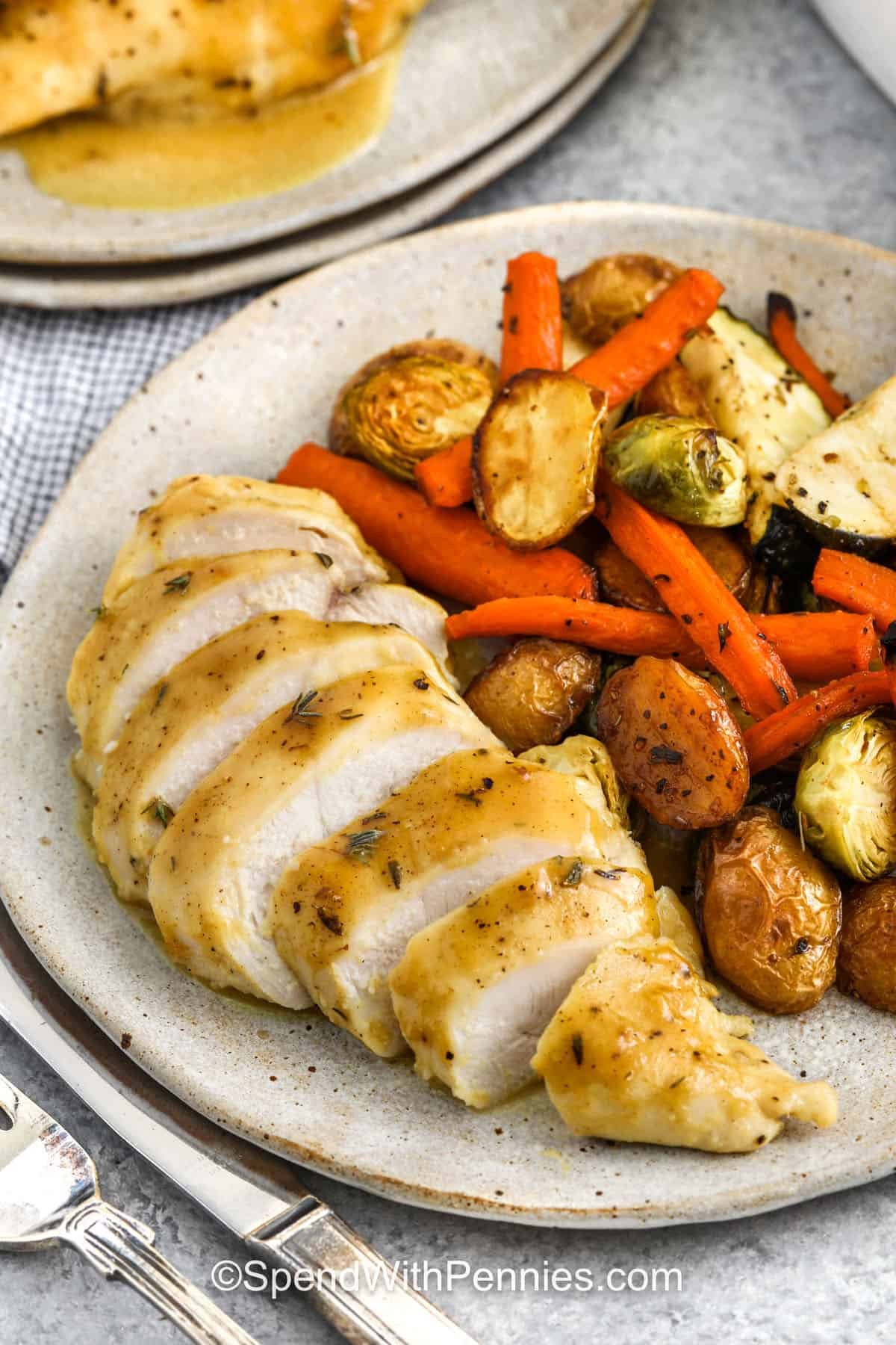 sliced Honey Mustard Chicken with potatoes and veggies