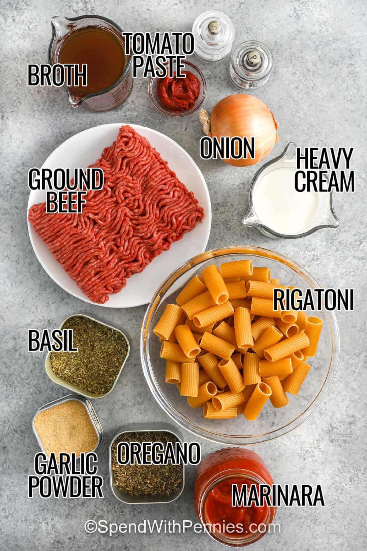 broth , tomato paste , onion , heavy cream , ground beef , rigatoni , basil , garlic powder , oregano , marinara with labels to make Creamy Ground Beef Pasta
