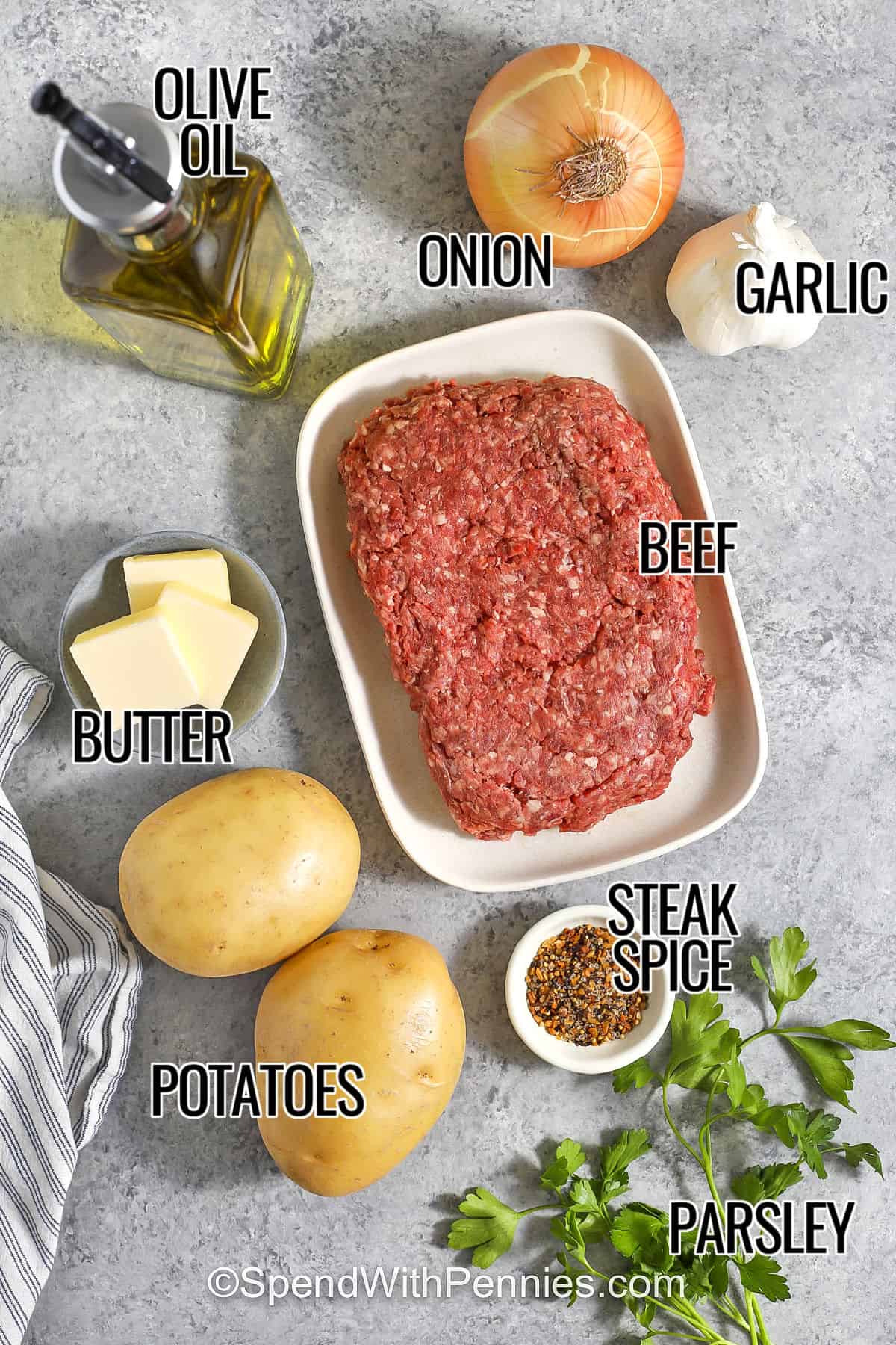 oil , onion , garlic , beef , butter , steak spice , parsley and potatoes with labels to make Hamburger Hash