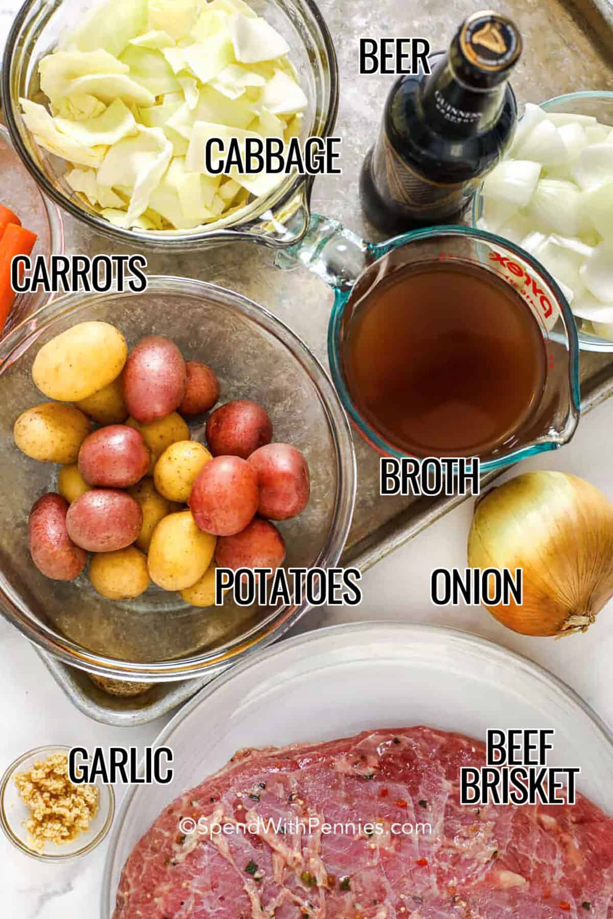 Instant Pot corned beef brisket comes out tender and richly seasoned, thanks to the spice packet and a mix of beer and broth. Cooking the vegetables after the meat prevents overcooked cabbage and keeps the potatoes and carrots perfectly tender. This corned beef in Instant Pot recipe is hearty, comforting, and ideal for meal prep since leftovers reheat well with a splash of broth. #spendwithpennies cabbage , beer , carrots , potatoes , broth , onion , garlic , beef brisket with labels to make Instant Pot Corned Beef