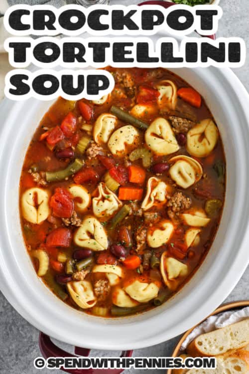 Crockpot Tortellini Soup in the pot with a title