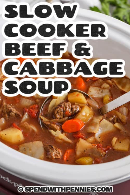 Slow Cooker Beef and Cabbage Stew in pot with a ladle and a title