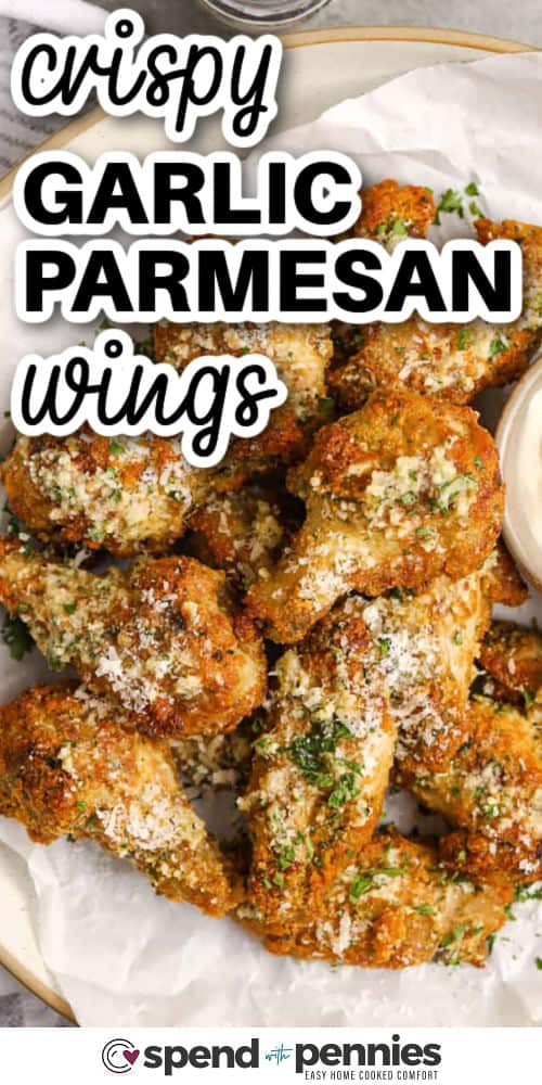 savory Garlic Parmesan Wings on a plate with writing