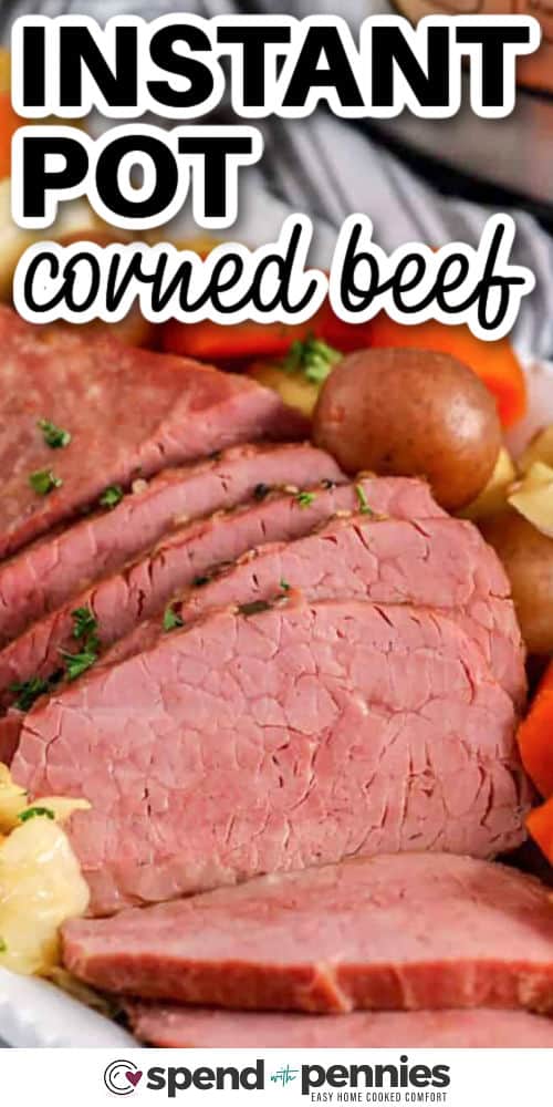 Make Instant Pot corned beef for a cozy winter dinner that feels special but stays easy. The brisket turns juicy and sliceable, while the seasoned cooking liquid becomes a warm finishing sauce for cabbage, carrots, and potatoes. This pressure cooker corned beef method keeps dishes to a minimum and makes leftovers perfect for Reuben sandwiches or corned beef hash. #spendwithpennies close up of Instant Pot Corned Beef with writing
