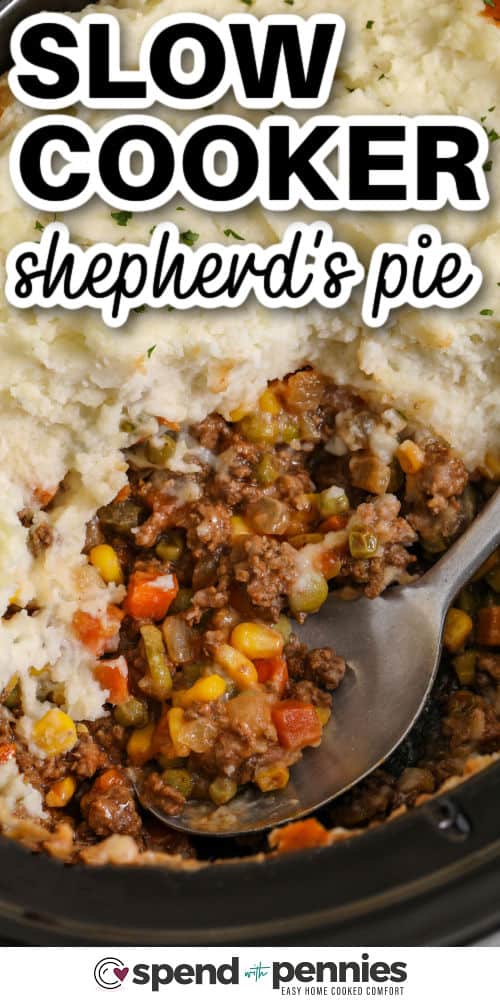 Make Slow Cooker shepherd's pie on busy days with frozen mixed vegetables and prepared mashed potatoes. Browning the meat first adds deeper flavor, then a quick gravy mix sauce with tomato paste and Worcestershire cooks into a savory filling. Spread thick mashed potatoes edge-to-edge so the topping stays fluffy. #spendwithpennies close up of Slow Cooker Shepherd's Pie in the pot with a spoon and writing