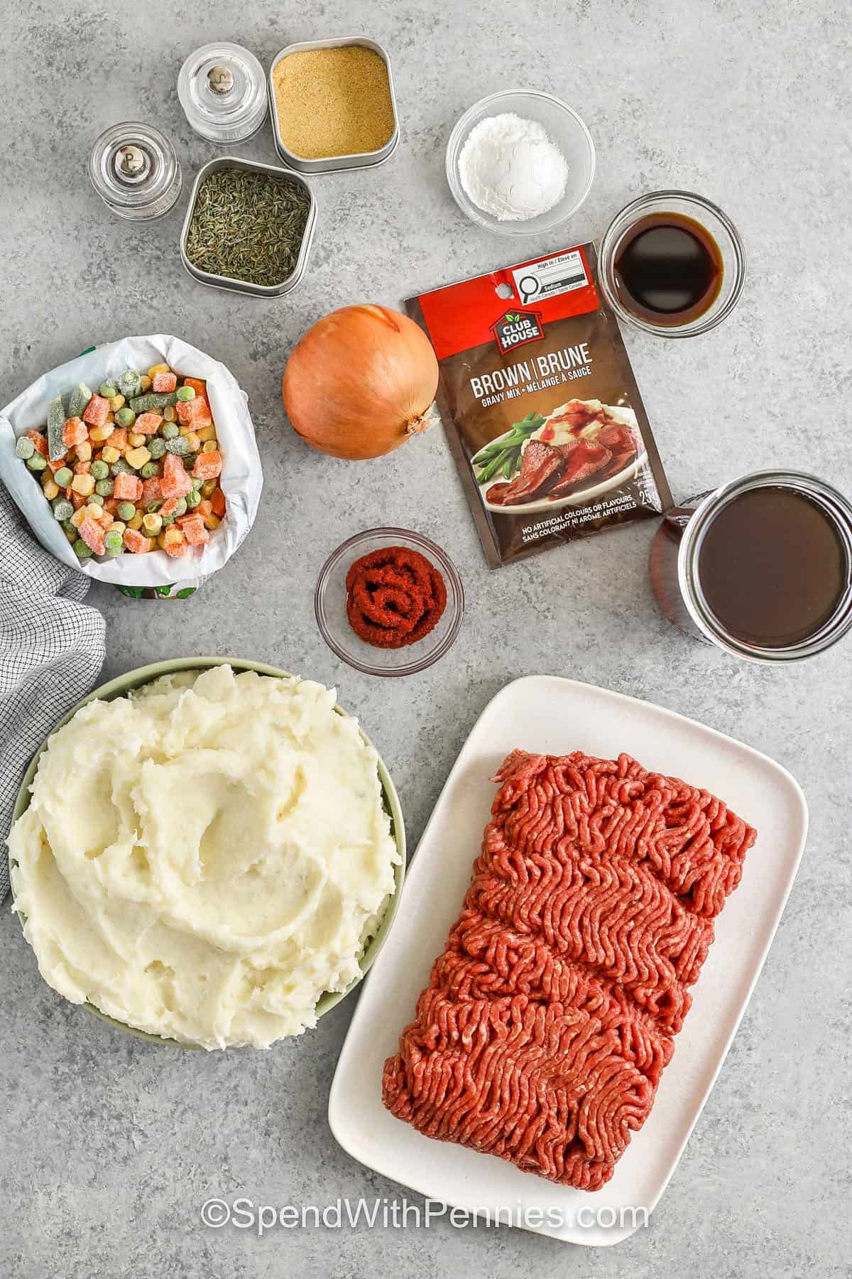 Slow Cooker shepherd's pie is freezer-friendly comfort food that tastes even better the next day. Use lean ground beef or lamb, frozen mixed vegetables, and a quick sauce made with beef broth, gravy mix, and seasonings. Spread thick mashed potatoes over the top so the layers stay distinct. Cool leftovers quickly, store airtight, and reheat covered for a creamy topping and rich gravy. #spendwithpennies ingredients to make Slow Cooker Shepherd's Pie