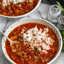 Two servings of slow cooker stuffed pepper soup in bowls