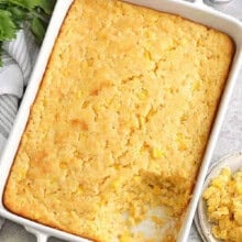 casserole dish of Corn Casserole with a potion taken out