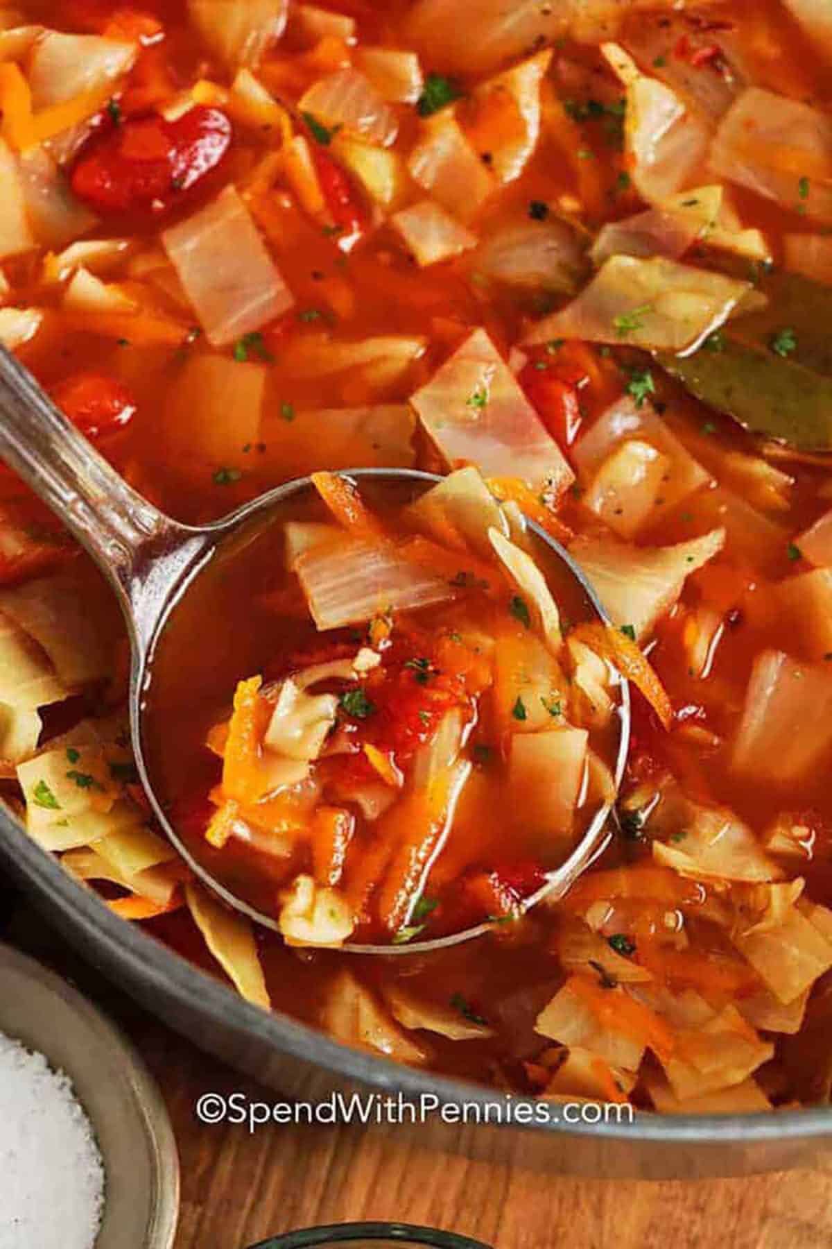 Quick Cabbage Soup in pot with a paddle