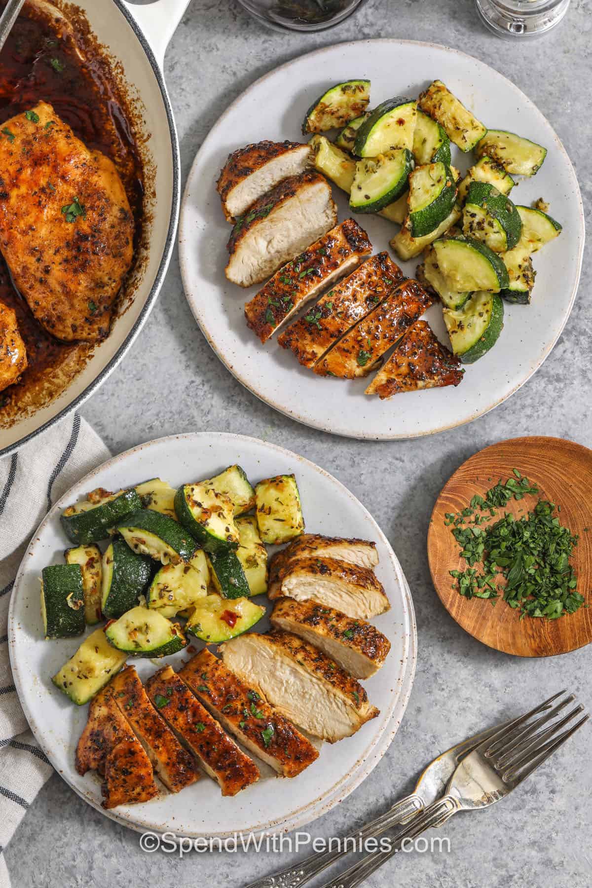 Make this honey balsamic chicken recipe in one skillet for a sweet-tangy dinner that tastes special without extra steps. Chicken breasts are seasoned, browned until golden, then gently simmered in balsamic vinegar and honey until juicy. A quick butter finish turns the pan juices into a silky glaze. Pair it with asparagus, cauliflower, or rice pilaf for an easy, sauce-friendly meal. #spendwithpennies plates of Balsamic Chicken with zucchini