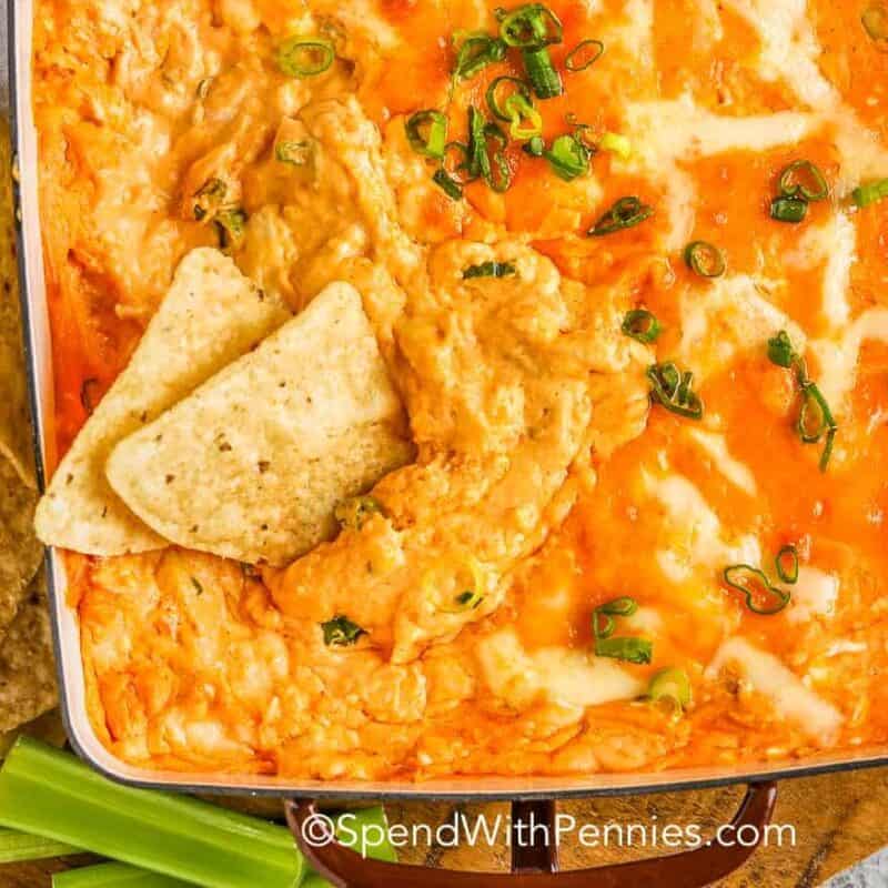 buffalo chicken dip in a dish with tortilla chips