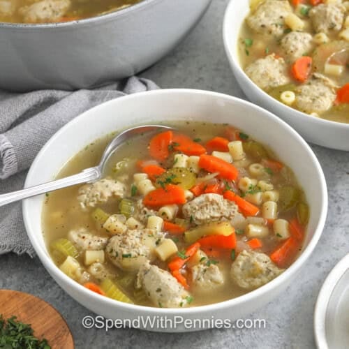 bowl of Chicken Meatball Soup with a spoon