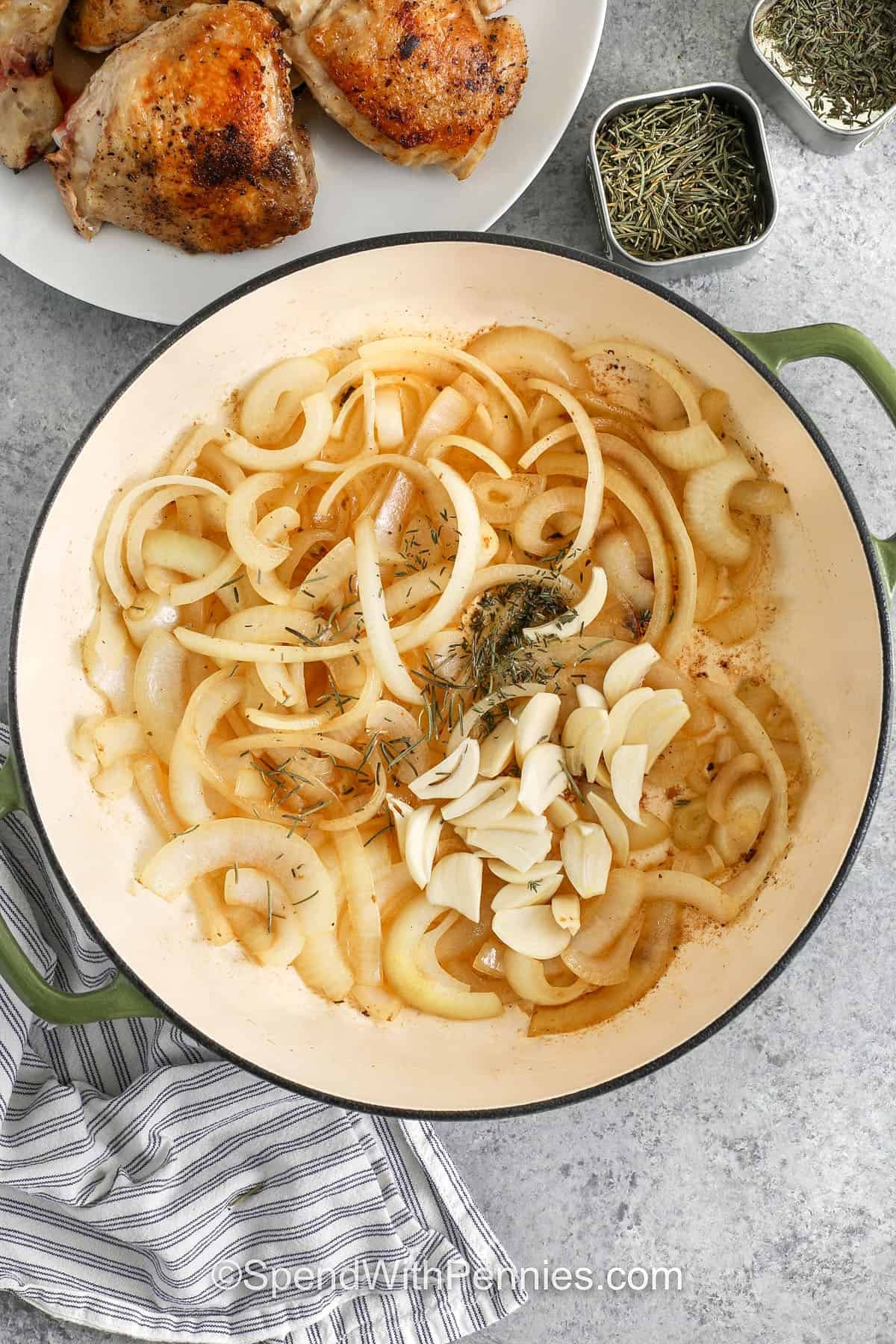 cooking onions , garlic and seasonings to make Easy Braised Chicken