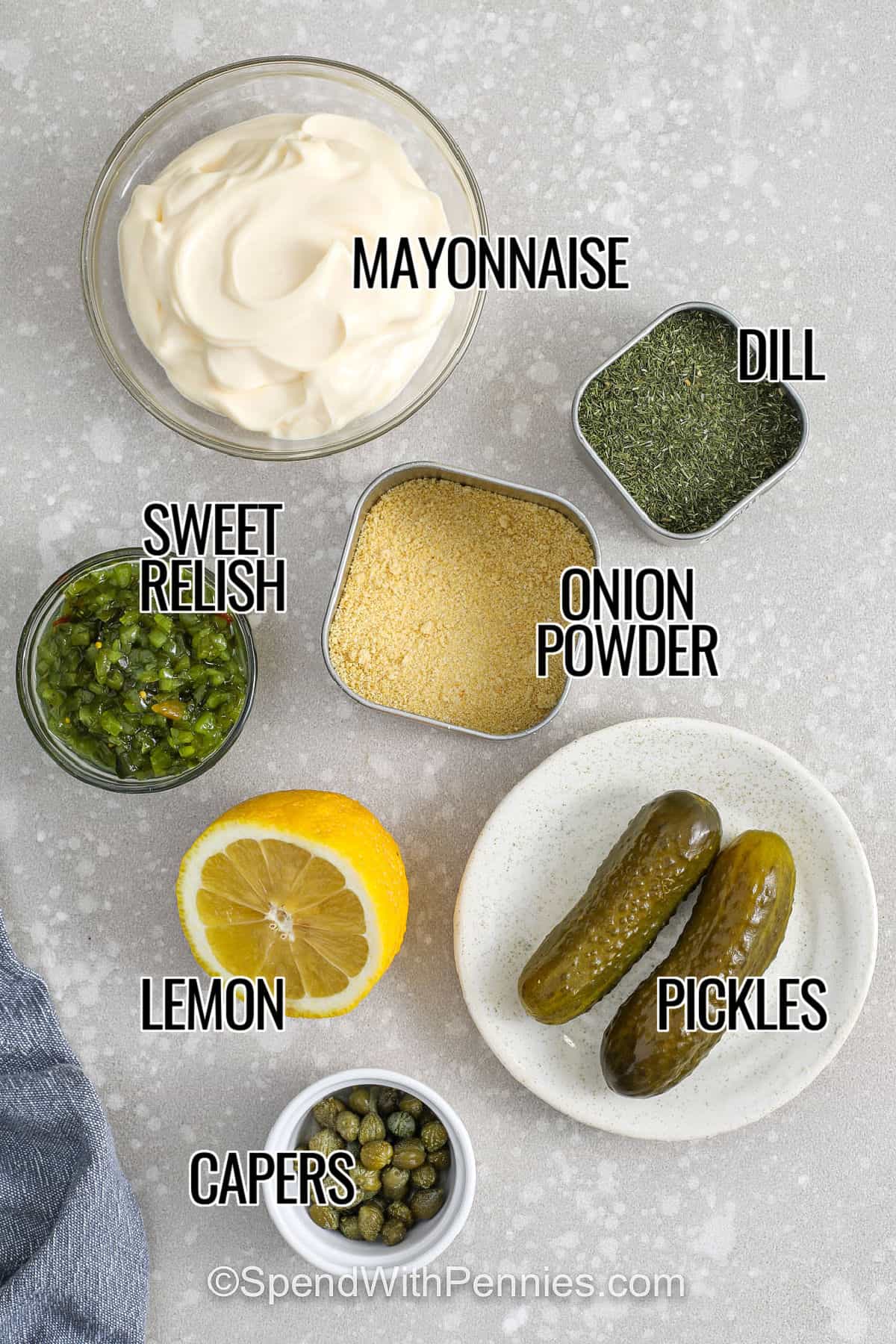 This quick tartar sauce recipe is the easiest way to make seafood taste better with almost no effort. Mayo and sweet relish create a creamy base, while finely chopped dill pickles add crunch and tang. Lemon juice brightens the flavor, and dried dill gives it a classic finish. Chill for 30 minutes so the sauce tastes blended and smooth. Serve with fried fish, baked cod, or shrimp for a fresh dip. #spendwithpennies mayonnaise , dill , onion powder , sweet relish , lemon , capers and pickles with labels to make Tartar Sauce Recipe