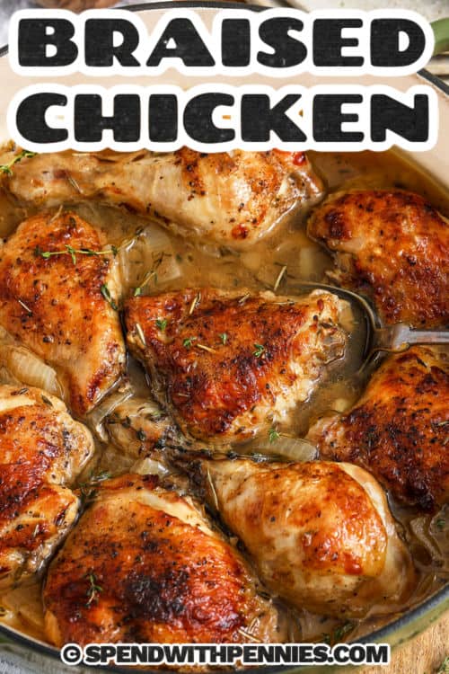 taking a piece of Easy Braised Chicken out of the pot with a title