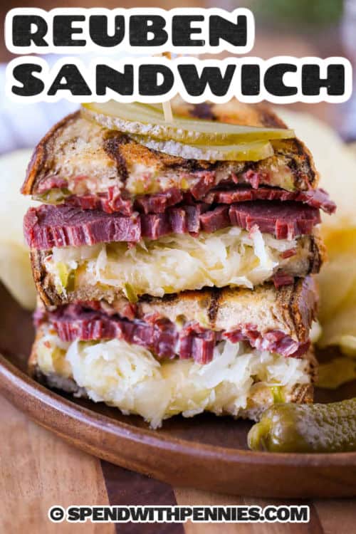 plated Reuben Sandwich with chips and a title