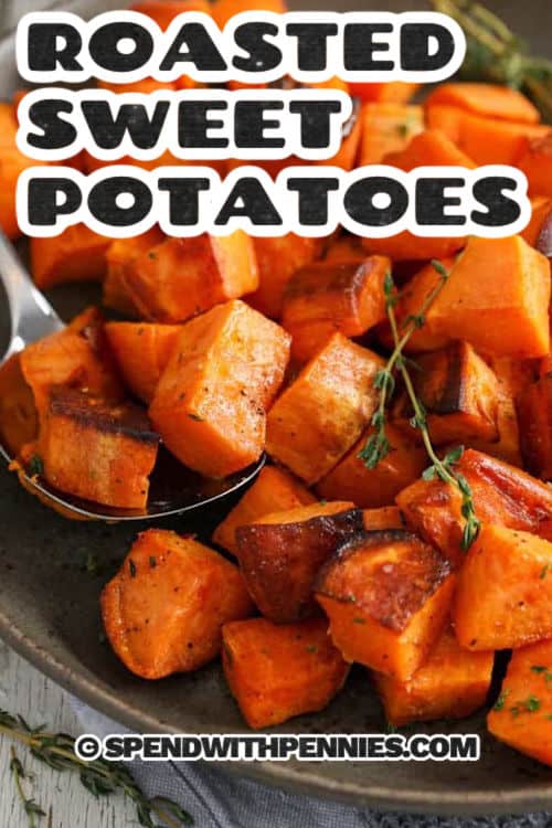 Savory roasted sweet potatoes are an easy sheet pan side with great color and big flavor. Cube sweet potatoes, toss with olive oil and garlic powder, then roast until fork-tender and caramelized at the edges. Spreading them in a single layer helps them brown instead of steam. Serve with pork tenderloin or chicken, and use leftovers in salads and meal prep bowls. #spendwithpennies plated Roasted Sweet Potatoes with a title