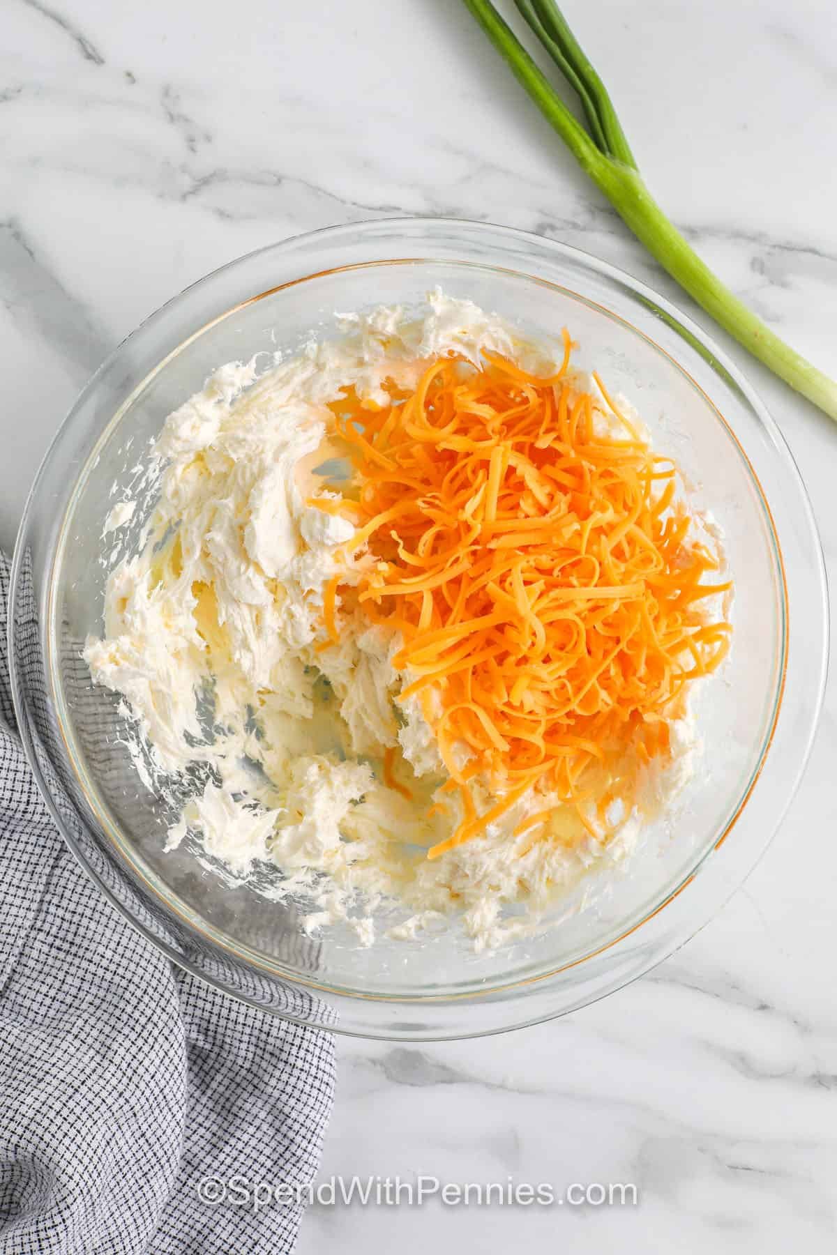 pepper jelly cheese dip ingredients in a glass bowl