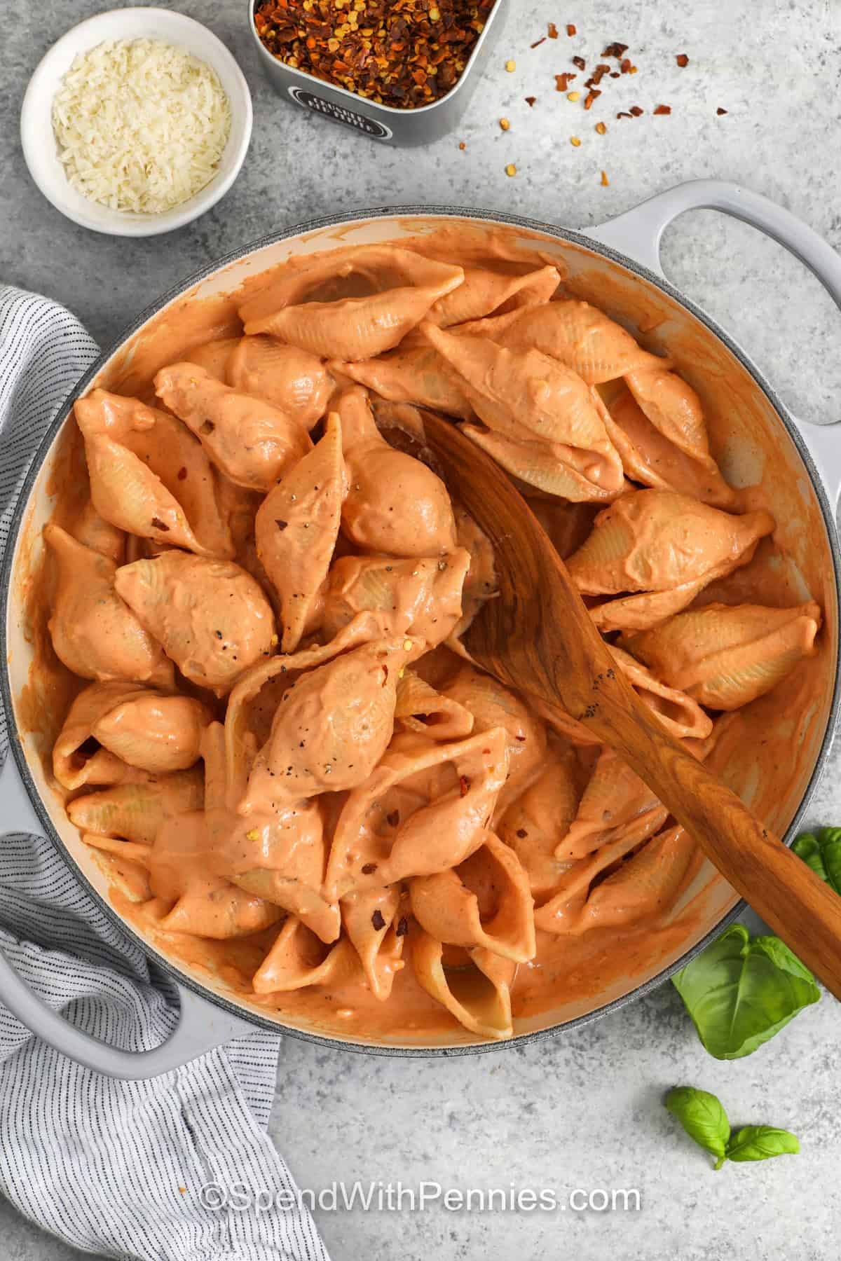 mixing noodles with Cottage Cheese Pasta Sauce