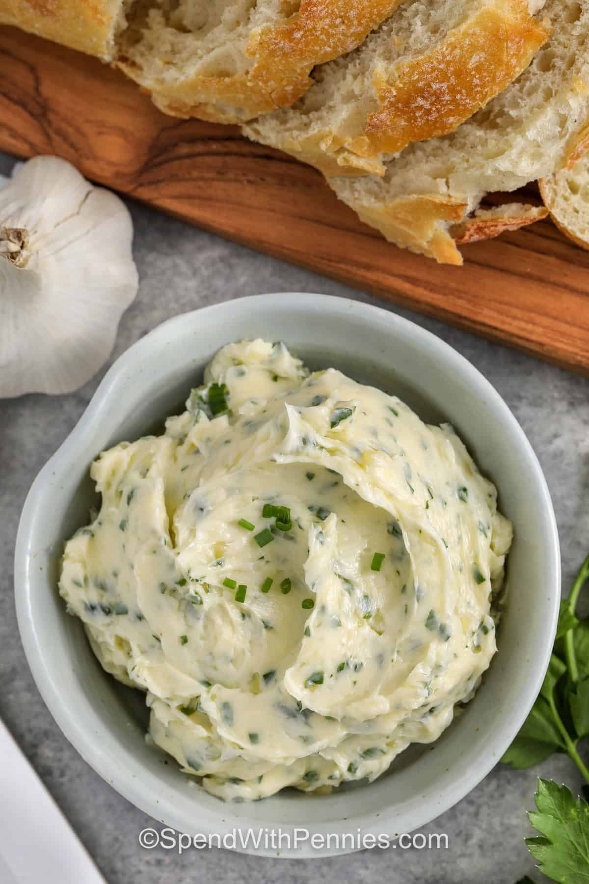 bowl of Garlic Butter Recipe with bread slices