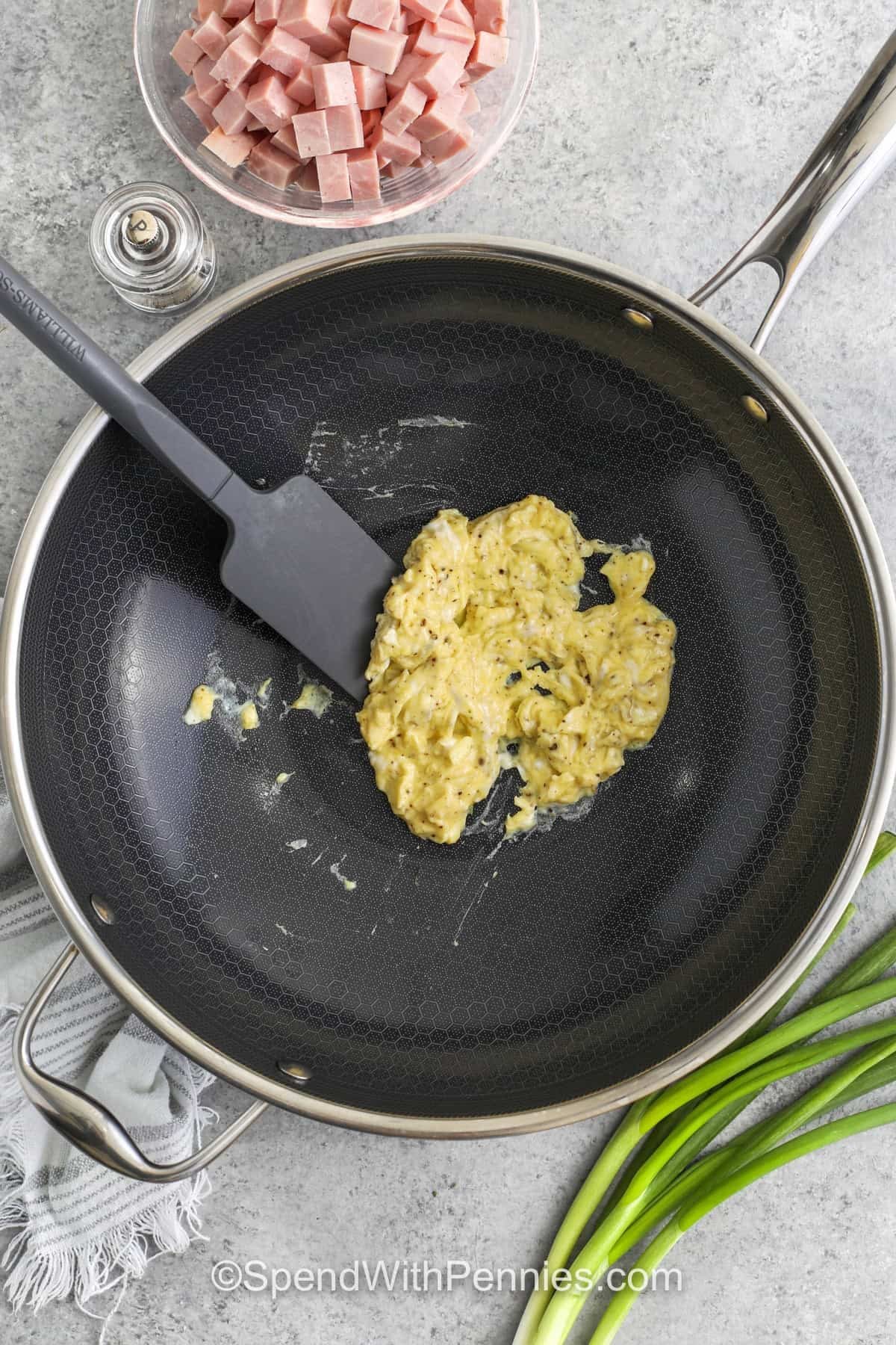 egg for ham fried rice in a skillet