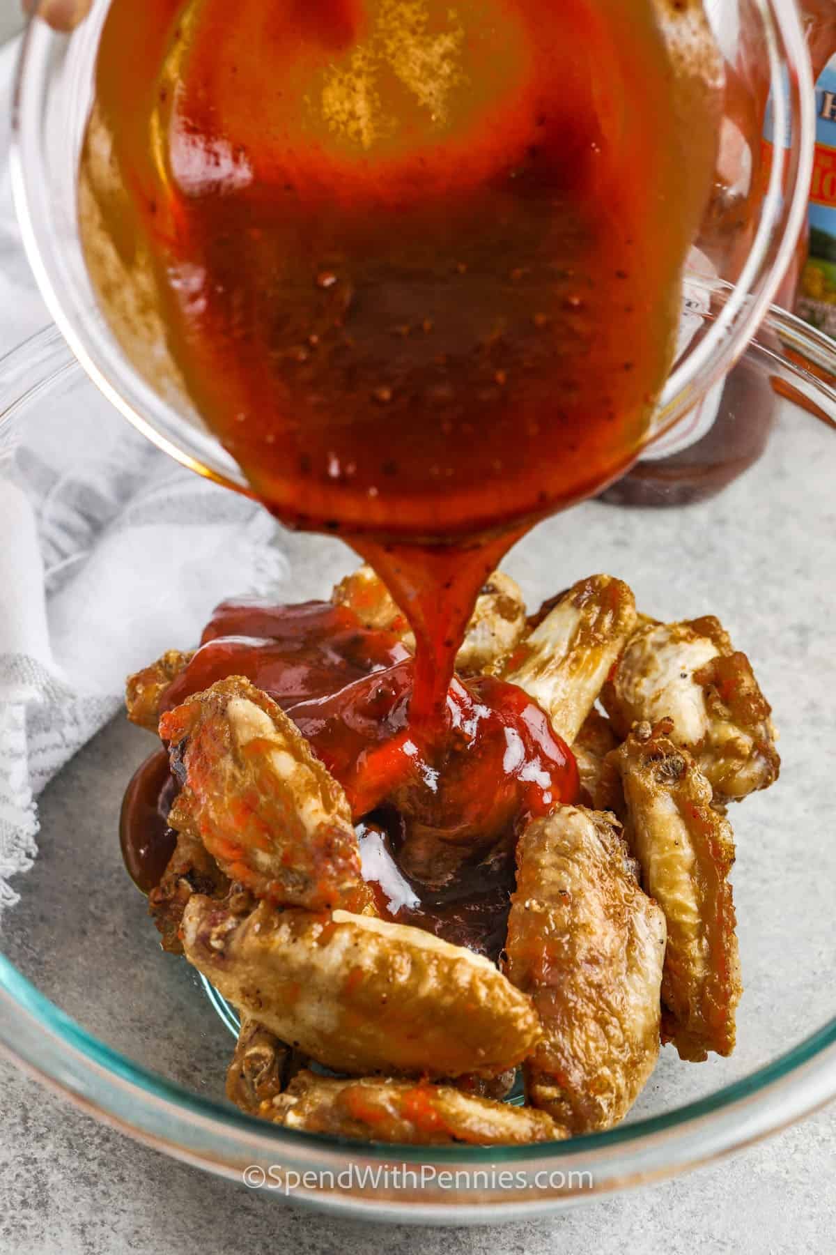 adding honey bbq sauce to wings to make Honey BBQ Wings