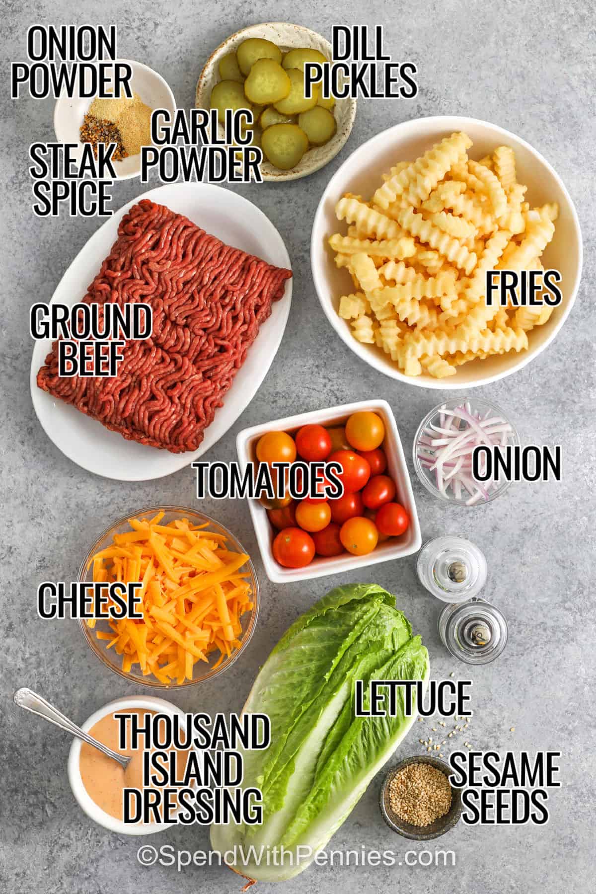 dill pickles , ground beef , steak spice , fries , tomatoes , onion , cheese , thousand island dressing , lettuce , sesame seeds , onion , onion powder , garlic powder with labels to make Burger Bowls