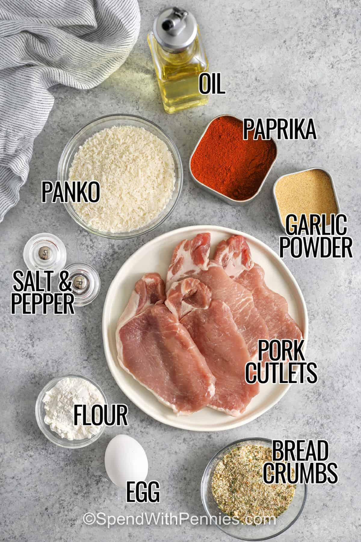 oil , paprika , garlic powder , panko , flour , pork , flour , egg , bread crumbs , salt and pepper with labels to make Pork Cutlets