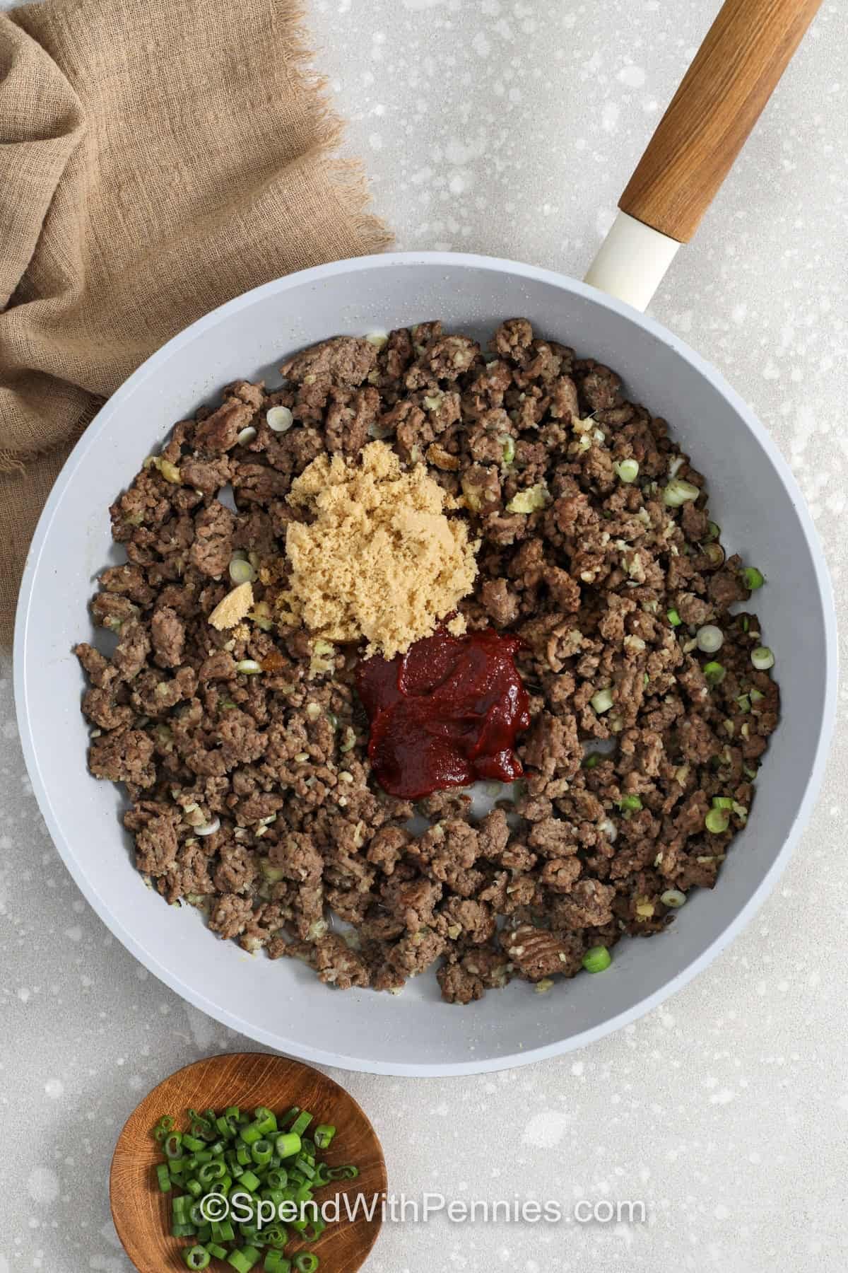 adding sauce and brown sugar to ground beef to make Korean Ground Beef Bowls