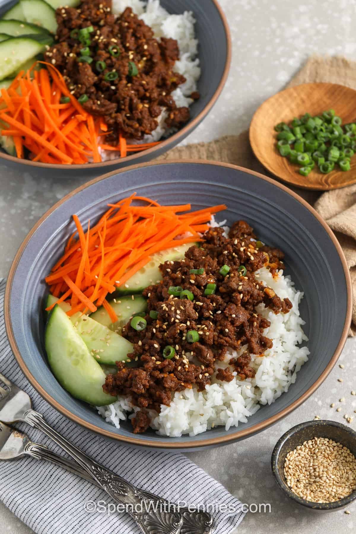 Korean Ground Beef Bowls with sesame seeds on top