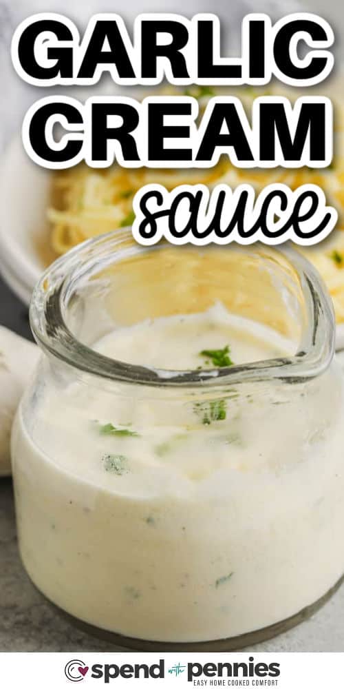 a serving dish with prepared garlic cream sauce with a title