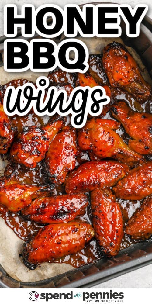 Honey BBQ Wings in the fryer with writing