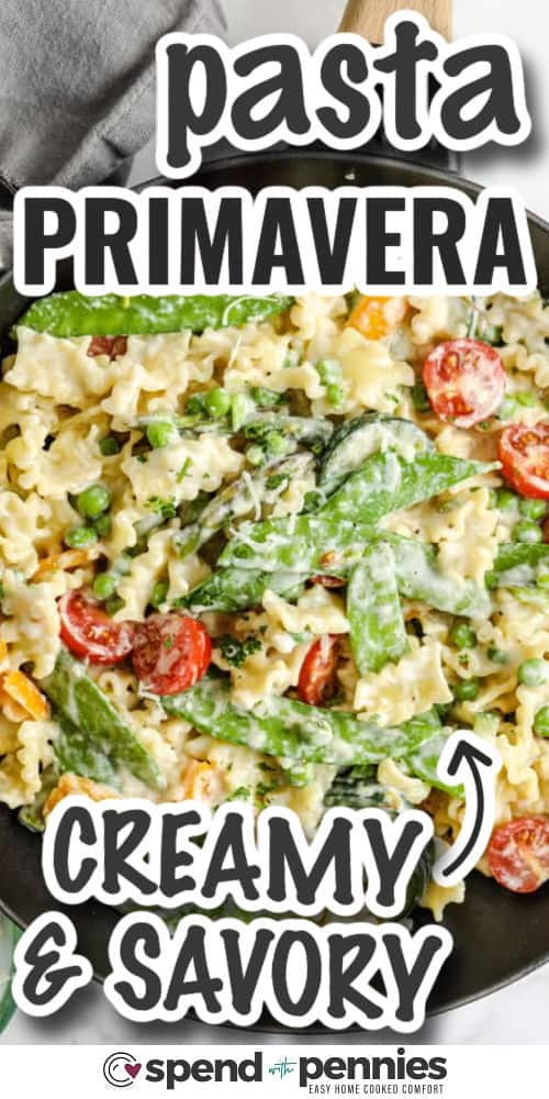 pasta primavera in a skillet with writing