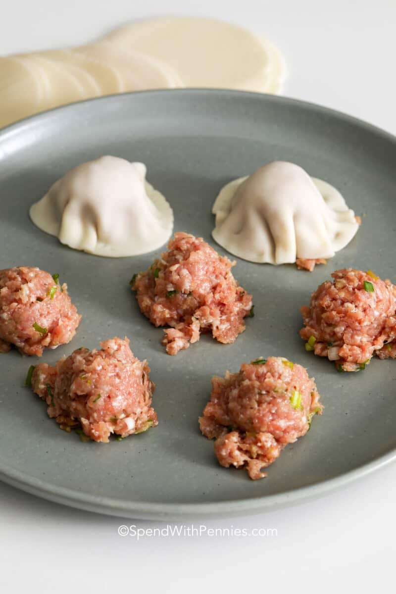 Preparing blanket dumplings for cooking