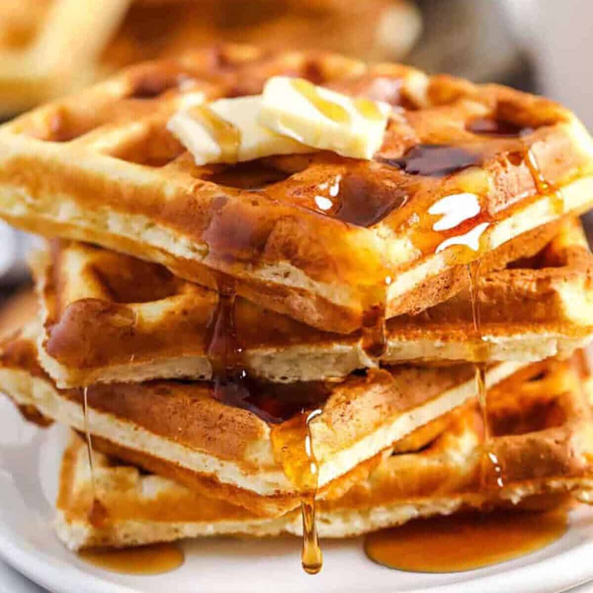 plated Homemade Waffle Recipe waffles with butter and syrup