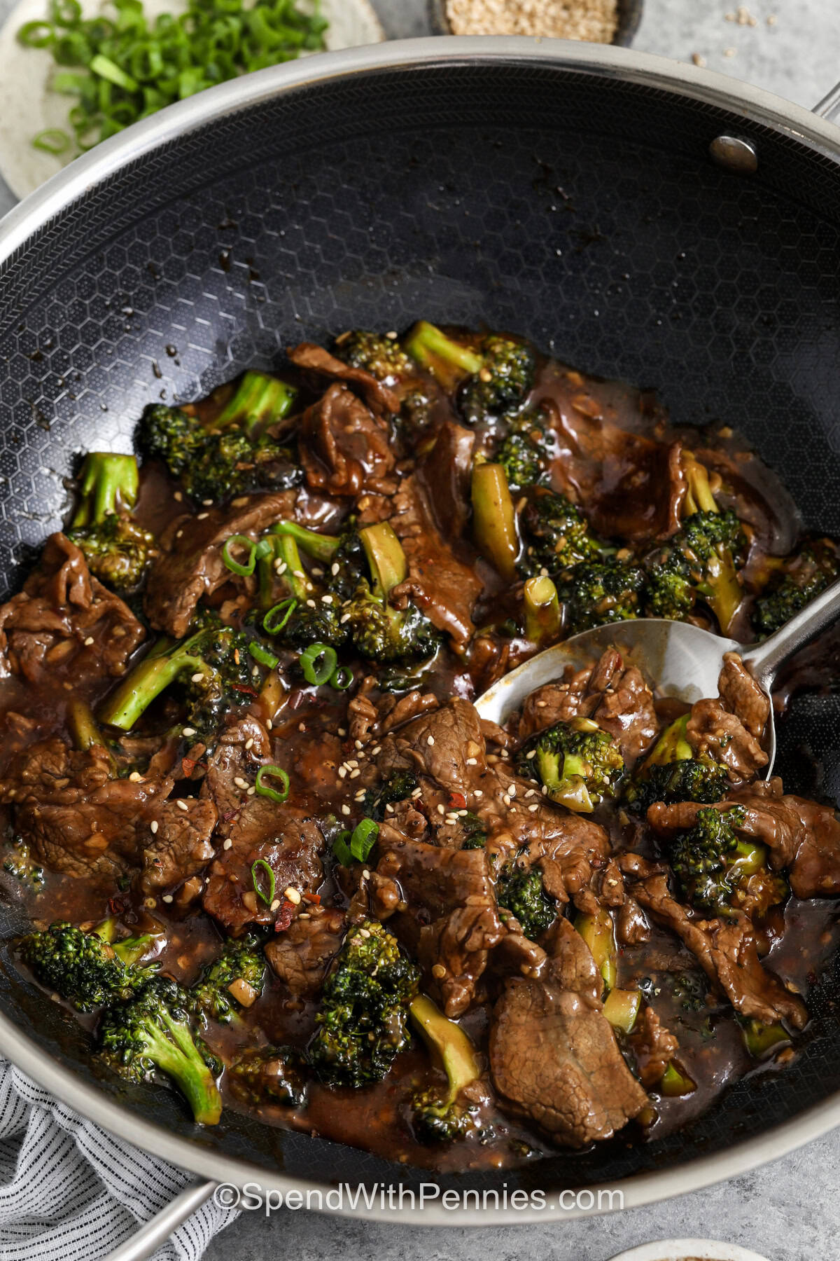 This homemade beef and broccoli recipe is a reliable dinner when you want something saucy, flavorful, and family friendly without spending all evening in the kitchen. This version uses steak, fresh broccoli, garlic, ginger, soy sauce, and brown sugar for a rich stir-fry finish. It is easy to serve over rice or noodles and works well for leftovers the next day. #spendwithpennies close up of Beef and Broccoli Recipe in pan