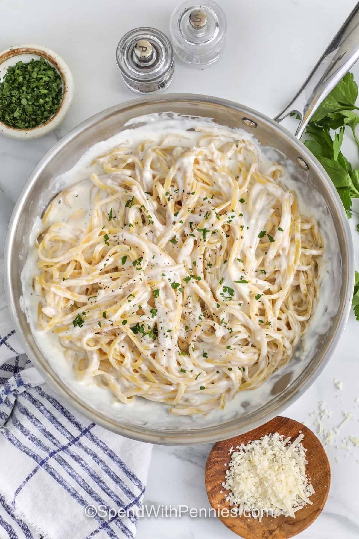 creamy Cottage Cheese Alfredo Sauce on pasta in the pot